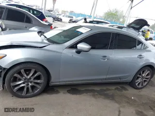 2017 Mazda Mazda6 Touring with VIN JM1GL1V59H1122054, listed as a IAAI auction lot 41896616 with 114,422 mi miles. Bid and sale history available at carsss.com. Image 15.