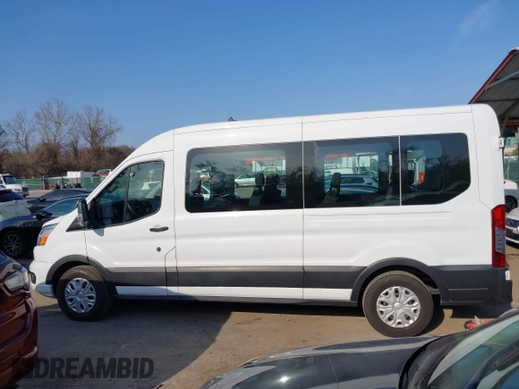 2021 Ford Transit Passenger XL with VIN 1FBAX2C89MKA49631, listed as a IAAI auction lot 41773770 with 77,260 mi miles and . Bid and sale history available at DreamBid. Image 14.