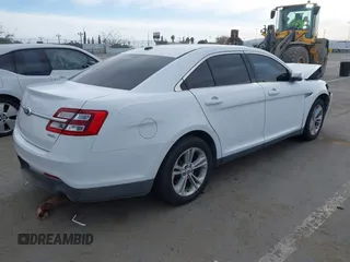 2013 Ford Taurus SEL with VIN 1FAHP2E81DG121759, listed as a IAAI auction lot 41939931 with 110,756 mi miles. Bid and sale history available at carsss.com. Image 4.