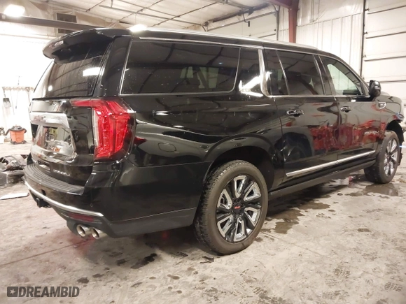 2021 GMC Yukon XL Denali with VIN 1GKS2JKL3MR149850, listed as a IAAI auction lot 41588274 with 77,181 mi miles. Bid and sale history available at carsss.com. Image 4.