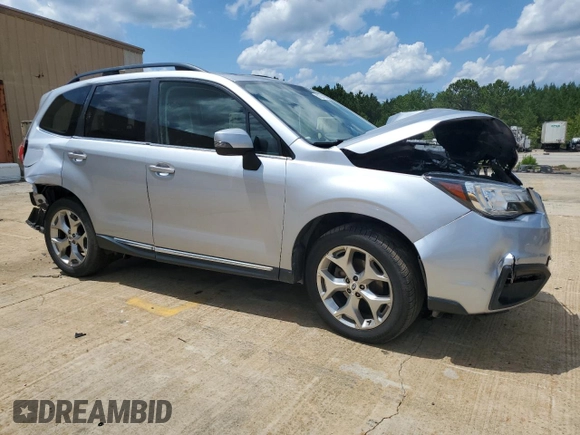 2017 Subaru Forester Touring with VIN JF2SJAWC9HH565195, listed as a Copart auction lot 61631195 with 40,715 mi miles and Salvage title. Bid and sale history available at DreamBid. Image 4.