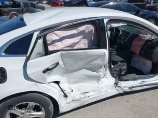 2020 Chevrolet Malibu LS with VIN 1G1ZB5STXLF012642, listed as a IAAI auction lot 41777011 with 69,100 mi miles and . Bid and sale history available at DreamBid. Image 6.