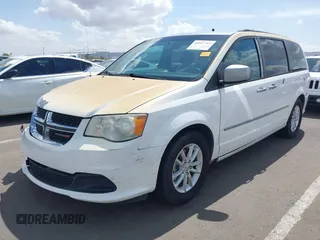 2013 Dodge Grand Caravan SXT with VIN 2C4RDGCG3DR600651, listed as a IAAI auction lot 41947769 with 201,824 mi miles and . Bid and sale history available at DreamBid. Image 2.