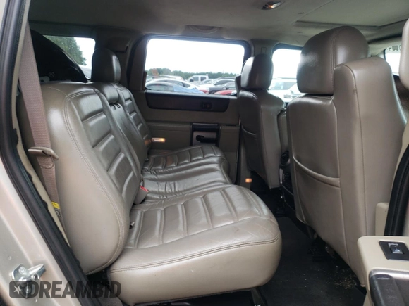 2003 Hummer H2 with VIN 5GRGN23U73H147303, listed as a Copart auction lot 72598604 with 0 mi miles and Clean Title. Bid and sale history available at carsss.com. Image 10.