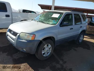 2004 Ford Escape XLT with VIN 1FMYU03114KA43652, listed as a IAAI auction lot 41701166 with 201,035 mi miles. Bid and sale history available at carsss.com. Image 2.