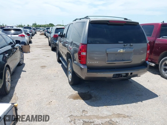 2011 Chevrolet Tahoe LS with VIN 1GNSCAE00BR343816, listed as a IAAI auction lot 42363718 with 253,212 mi miles and . Bid and sale history available at DreamBid. Image 3.