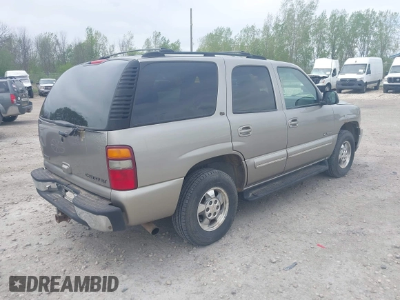 2001 Chevrolet Tahoe LS z VIN 1GNEC13T11J107893, wystawiony jako IAAI lot #42261213 z przebiegiem 338 454 mil mil oraz . Historia ofert i sprzedaży dostępna na DreamBid. Obrazek 4.
