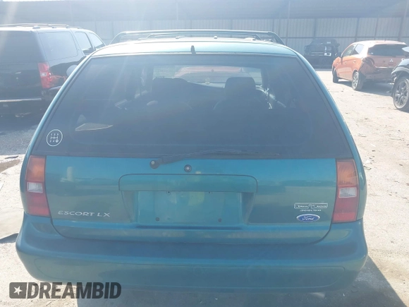 1997 Ford Escort LX z VIN 3FALP15P7VR158272, wystawiony jako IAAI lot #41833216 z przebiegiem 148 170 mil mil oraz . Historia ofert i sprzedaży dostępna na DreamBid. Obrazek 15.