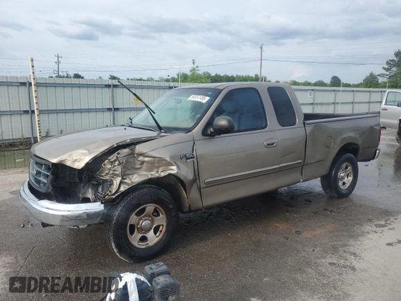 2003 Ford F-150 XL with VIN 1FTRX17LX3NA38576, listed as a Copart auction lot 54057495 with 173,811 mi miles and Salvage title. Bid and sale history available at DreamBid. Image 1.