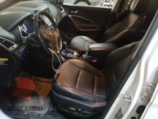 2017 Hyundai Santa Fe 2.0T z VIN 5XYZUDLA3HG456149, wystawiony jako Copart lot #37585923 z przebiegiem 111 627 mil mil oraz Szkoda całkowita • Salvage title. Historia ofert i sprzedaży dostępna na DreamBid. Obrazek 7.