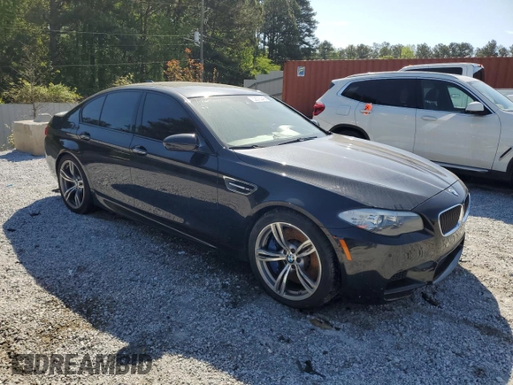 2013 BMW M5 z VIN WBSFV9C55DC772482, wystawiony jako Copart lot #52575345 z przebiegiem 173 513 mil mil oraz Czysty tytuł • Clean title. Historia ofert i sprzedaży dostępna na DreamBid. Obrazek 4.
