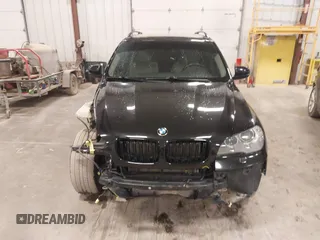 2012 BMW X5 35i with VIN 5UXZV4C55CL990510, listed as a IAAI auction lot 41849293 with 117,522 mi miles and . Bid and sale history available at DreamBid. Image 12.