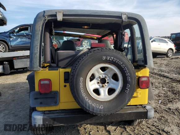 2001 Jeep Wrangler Sport with VIN 1J4FA49S21P312522, listed as a Copart auction lot 54698935 with 201,199 mi miles and Salvage Title. Bid and sale history available at carsss.com. Image 6.
