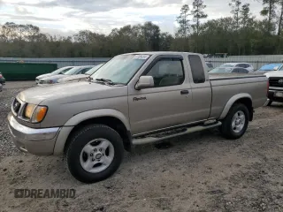 2000 Nissan Frontier XE with VIN 1N6ED26T5YC413840, listed as a Copart auction lot 81996434 with 189,884 mi miles and Salvage title. Bid and sale history available at DreamBid. Image 1.