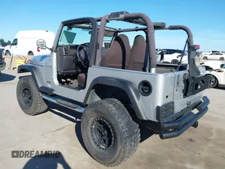 2002 Jeep Wrangler X with VIN 1J4FA39S42P763835, listed as a IAAI auction lot 42302645 with 233,634 mi miles and . Bid and sale history available at DreamBid. Image 3.