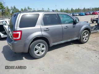 2011 Ford Escape Limited with VIN 1FMCU9EG6BKB01025, listed as a IAAI auction lot 42136708 with 210,349 mi miles. Bid and sale history available at carsss.com. Image 4.