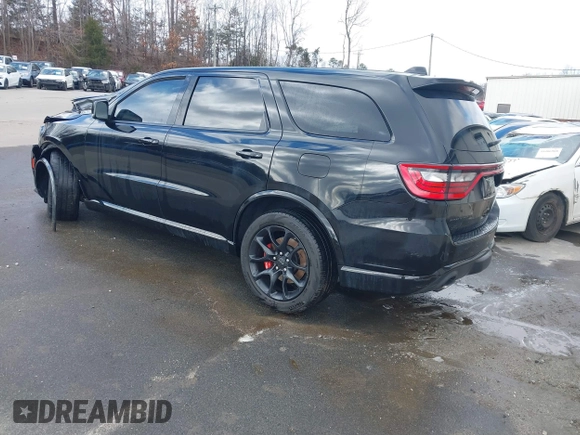 2023 Dodge Durango SRT Hellcat Premium with VIN 1C4SDJH90PC557375, listed as a IAAI auction lot 41328850 with 30,697 mi miles and . Bid and sale history available at DreamBid. Image 3.