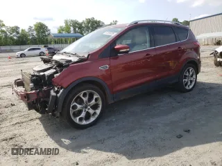 2015 Ford Escape Titanium z VIN 1FMCU0J93FUA66179, wystawiony jako Copart lot #57295035 z przebiegiem 82 889 mil mil oraz Szkoda całkowita • Salvage title. Historia ofert i sprzedaży dostępna na DreamBid. Obrazek 1.