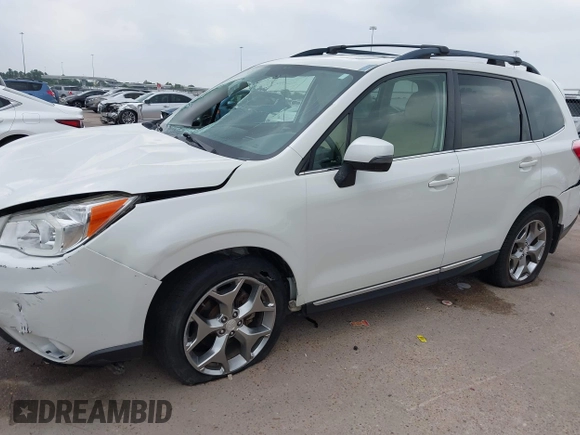 2016 Subaru Forester Touring z VIN JF2SJAVC2GH465083, wystawiony jako IAAI lot #42287323 z przebiegiem Nie podano mil oraz . Historia ofert i sprzedaży dostępna na DreamBid. Obrazek 18.
