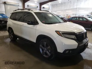 2020 Honda Passport Touring z VIN 5FNYF8H9XLB008647, wystawiony jako Copart lot #73320804 z przebiegiem 70 068 mil mil oraz Szkoda całkowita • Salvage title. Historia ofert i sprzedaży dostępna na DreamBid. Obrazek 4.