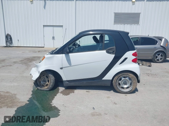 2009 Smart fortwo Pure with VIN WMEEJ31XX9K302737, listed as a IAAI auction lot 42124550 with 43,610 mi miles and . Bid and sale history available at DreamBid. Image 14.