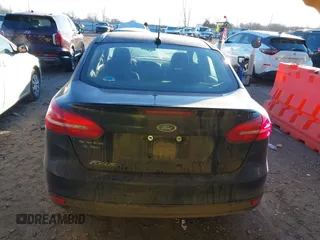 2017 Ford Focus SE with VIN 1FADP3F21HL288487, listed as a IAAI auction lot 41393074 with 87,883 mi miles. Bid and sale history available at carsss.com. Image 16.