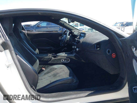 2019 Aston Martin Vantage z VIN SCFSMGAW4KGN01848, wystawiony jako IAAI lot #42032076 z przebiegiem 54 469 mil mil oraz . Historia ofert i sprzedaży dostępna na DreamBid. Obrazek 5.