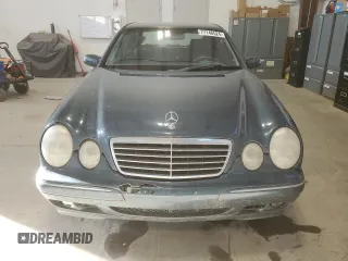 2000 Mercedes-Benz E-Class AWD with VIN WDBJF82G4YX027683, listed as a Copart auction lot 77146524 with 228,654 mi miles and Clean Title. Bid and sale history available at carsss.com. Image 5.