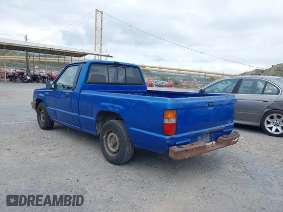 1990 Mitsubishi Mighty Max with VIN JA7FL24W8LP030657, listed as a IAAI auction lot 42014231 with 376,787 mi miles and . Bid and sale history available at DreamBid. Image 3.