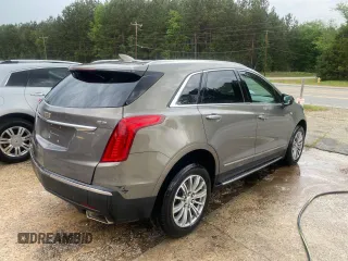 2019 Cadillac XT5 Luxury FWD with VIN 1GYKNCRS0KZ206086, listed as a Copart auction lot 54454825 with 93,621 mi miles and Salvage Title. Bid and sale history available at DreamBid. Image 4.