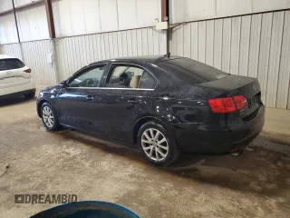 2014 Volkswagen Jetta SE with VIN 3VWD17AJ6EM387167, listed as a Copart auction lot 52251955 with 150,441 mi miles and Salvage title. Bid and sale history available at DreamBid. Image 2.