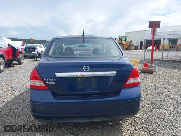 2011 Nissan Versa S with VIN 3N1BC1AP2BL408977, listed as a IAAI auction lot 42524102 with 195,285 mi miles and . Bid and sale history available at DreamBid. Image 16.