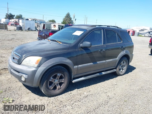2004 Kia Sorento LX with VIN KNDJC733945245222, listed as a IAAI auction lot 42056958 with 272,128 mi miles. Bid and sale history available at carsss.com. Image 2.
