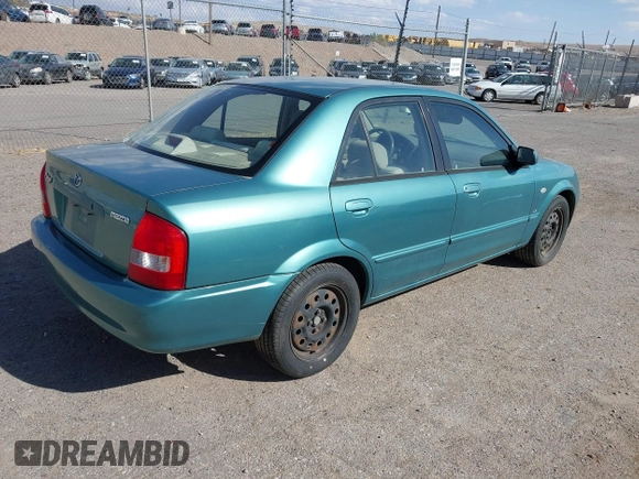 2002 Mazda Protege DX z VIN JM1BJ225021606891, wystawiony jako IAAI lot #42011997 z przebiegiem 134 758 mil mil oraz . Historia ofert i sprzedaży dostępna na DreamBid. Obrazek 4.