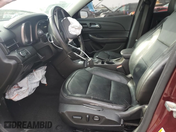 2016 Chevrolet Malibu LTZ with VIN 1G11E5SA9GF127502, listed as a Copart auction lot 77624464 with 158,683 mi miles and Salvage Title. Bid and sale history available at DreamBid. Image 7.