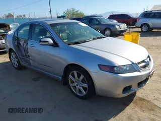 2004 Acura TSX w/Navigation with VIN JH4CL96944C002982, listed as a IAAI auction lot 41855710 with 165,129 mi miles. Bid and sale history available at carsss.com. Image 1.