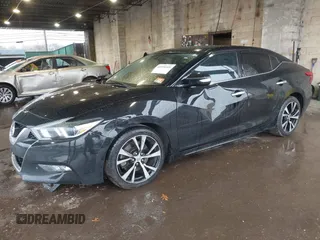 2017 Nissan Maxima SV z VIN 1N4AA6AP1HC447467, wystawiony jako IAAI lot #40918468 z przebiegiem 166 352 mil mil oraz . Historia ofert i sprzedaży dostępna na DreamBid. Obrazek 6.