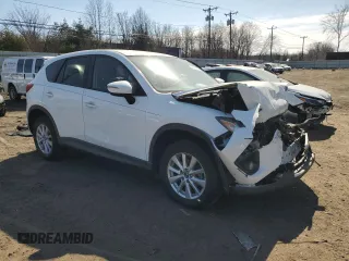 2015 Mazda CX-5 Touring with VIN JM3KE4CY6F0470164, listed as a Copart auction lot 48616815 with 0 mi miles and Salvage Title. Bid and sale history available at carsss.com. Image 4.