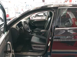 2024 Volkswagen Tiguan SE z VIN 3VV3B7AX4RM076330, wystawiony jako IAAI lot #42752482 z przebiegiem 25 282 mil mil oraz . Historia ofert i sprzedaży dostępna na DreamBid. Obrazek 14.