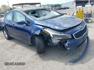 2018 Kia Forte LX with VIN 3KPFK4A77JE230246, listed as a IAAI auction lot 42031081 with 90,456 mi miles. Bid and sale history available at carsss.com. Image 1.