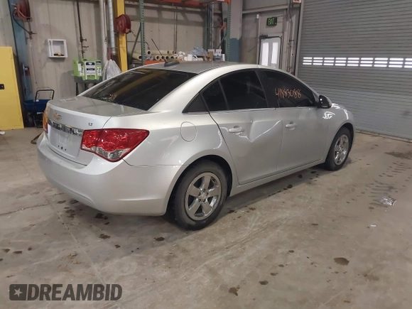 2015 Chevrolet Cruze LT with VIN 1G1PC5SB4F7132513, listed as a IAAI auction lot 41883088 with 131,185 mi miles and . Bid and sale history available at DreamBid. Image 4.