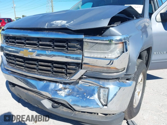 2016 Chevrolet Silverado 1500 LT with VIN 3GCUKREC8GG219524, listed as a IAAI auction lot 41087657 with 123,010 mi miles and . Bid and sale history available at DreamBid. Image 6.