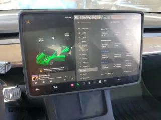 2021 Tesla Model 3 Standard Range Plus with VIN 5YJ3E1EA7MF978749, listed as a Copart auction lot 43377955 with 51,871 mi miles and Salvage Title. Bid and sale history available at carsss.com. Image 9.
