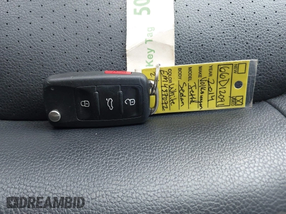 2014 Volkswagen Jetta SE with VIN 3VWD17AJ5EM437072, listed as a IAAI auction lot 42463048 with 99,030 mi miles and . Bid and sale history available at DreamBid. Image 11.
