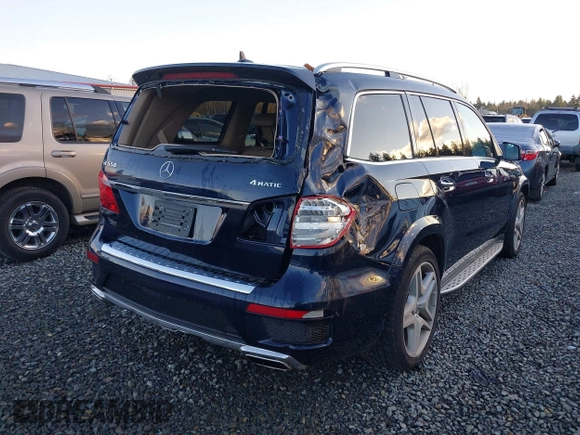 2016 Mercedes-Benz GL with VIN 4JGDF7DE2GA661379, listed as a IAAI auction lot 41059705 with 60,558 mi miles. Bid and sale history available at carsss.com. Image 4.