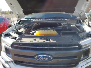 2018 Ford F-150 XL with VIN 1FTEW1EG1JKE29623, listed as a IAAI auction lot 40615703 with 122,846 mi miles and . Bid and sale history available at DreamBid. Image 10.