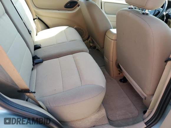 2006 Ford Escape XLS z VIN 1FMYU02Z36KB10195, wystawiony jako Copart lot #53108415 z przebiegiem Nie podano mil oraz Szkoda całkowita • Salvage title. Historia ofert i sprzedaży dostępna na DreamBid. Obrazek 12.