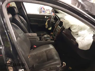 2005 Cadillac STS z VIN 1G6DW677450147731, wystawiony jako IAAI lot #40770047 z przebiegiem 150 066 mil mil oraz . Historia ofert i sprzedaży dostępna na DreamBid. Obrazek 5.