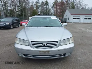 2006 Hyundai Azera SE z VIN KMHFC46F46A077702, wystawiony jako IAAI lot #42088782 z przebiegiem 103 033 mil mil oraz . Historia ofert i sprzedaży dostępna na DreamBid. Obrazek 13.