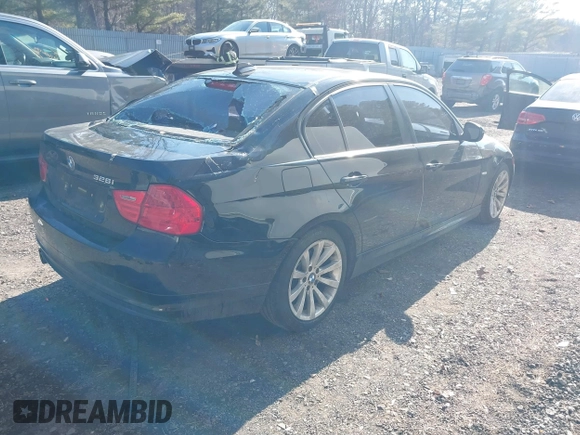 2011 BMW 3 Series 328i with VIN WBAPH5G50BNM83160, listed as a IAAI auction lot 41654019 with 111,596 mi miles. Bid and sale history available at carsss.com. Image 4.